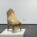 Shirley Villavicencio Pizango over ‘Wrapped Chair’ van Christo